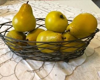 Staging item:  faux pears with metal basket