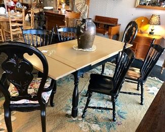 Solid Wooden Extending Farm-Type Table with 4 black Solid Wooden Chairs (Both Ends of the Table Extend or can be slid underneath Table to shorten its length)