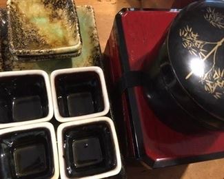 Assorted Japanese glazed pottery servers, lacquered box with coasters