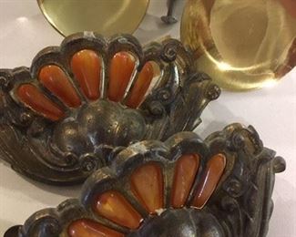 Detail of several, bagged sets of vintage drawer pulls, some with Bakelite insets in waterfall form