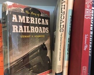 Assorted hardcover books on trains