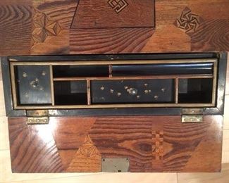 Inside of artist box of wood marquetry