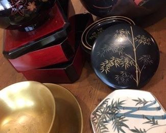 Lacquered wood Japanese bowls, coaster set, lunch box, hand-painted small plate. The gold lacquered wood bowl and plate has bird motif