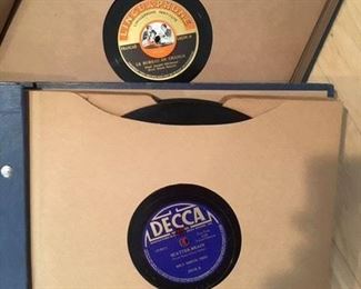 Detail of inside pages of 78rpm phonograph albums complete with phonograph records. Labels include: Decca, MGM, Linguaphone, Victrola, Victor, CCCP, Columbia, Capital, among others
