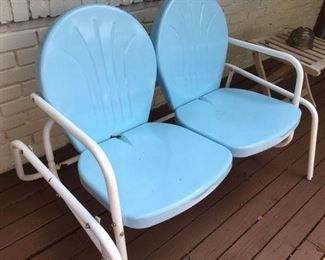 Retro repro two-seat patio glider in blue and white painted metal