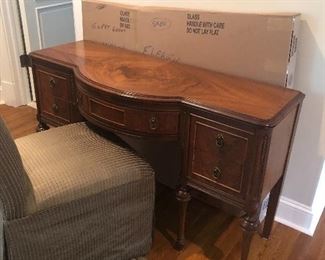 Desk or make up vanity. It has mirror in box.  Chair too on rollers.  All is 
$295