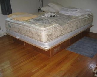 Another queen mattress on water bed base with storage