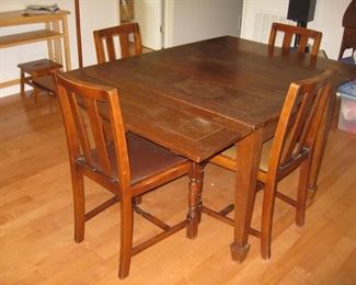 draw leaf oak table and 4 chairs extended