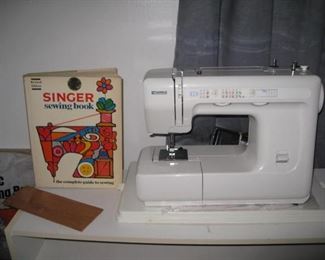 Kenmore sewing machine. Vintage Singer sewing book