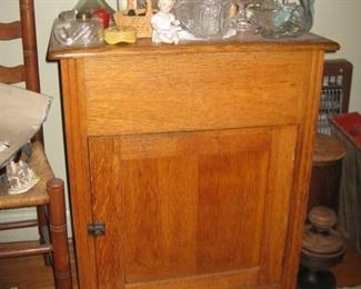 oak cabinet with top that lifts
