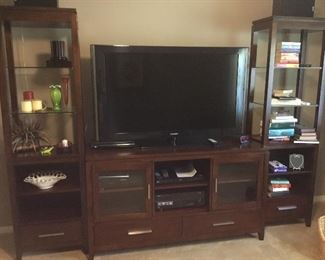 Entertainment center sold but TV 54” Samsung available 