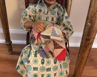 grandmother quilting doll