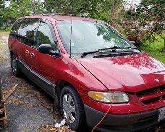1996 Dodge Caravan, getting tired aired up but it seems to have frozen brakes and possibly a belt.  Can get it started after it sitting a year (got another car). Asking $600 obo