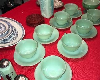 TEA CUPS AND SAUCERS