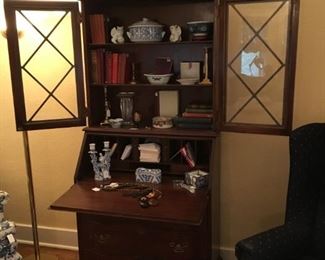 Secretary filled with fun decor items