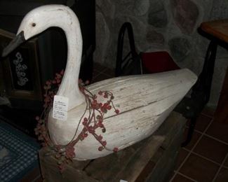 Wood swan decoy with H&S initials on the bottom