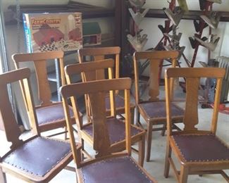 Set of 7 very nice oak chairs with vintage leather seats