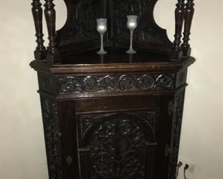 carved corner cabinet