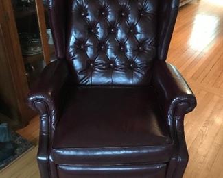 A pair of leather Chesterfield recliners