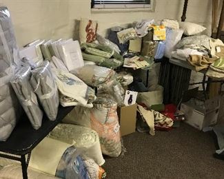 Tons of brand new linens