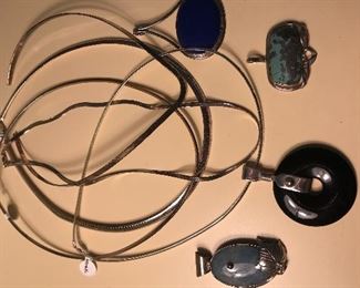 Sterling silver chokers and various stone pendants 
