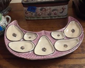 Crescent shaped oyster plate.