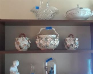 Set of English porcelain baskets wth applied flowers