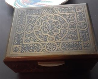 Box with intricate metal plate 