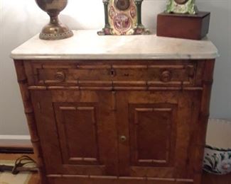 Marble top chest;  porcelain face mantle clocks, Bradley and Hubbard lamp