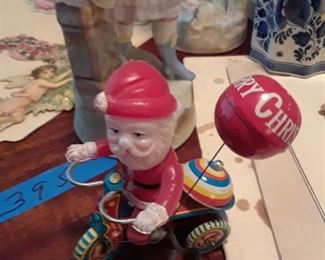 Santa on a tricycle. Japanese lithograph toy wind up from the 1950s