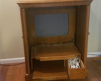 Oak TV cabinet opened, 2 shelves that slide out and 1 drawer
