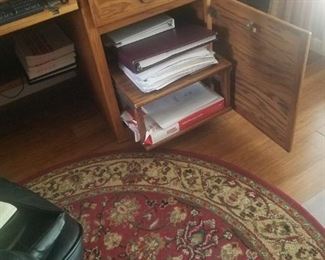 Desk has 1 drawer and slide out printer shelf. 