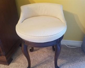Small upholstered swivel chair