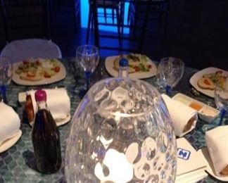 Collections of reflective bubble glass in a variety of shapes and sizes. Illuminated acrylic tables. 