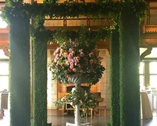 Boxwood pergolas, arbors, arches and walkways. Feature tables in wood, iron, marble and mirror with coordinating plinths and risers. Large-scale urns and classic garden vessels. 
