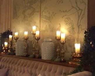 Hand-painted screens, colored porcelain ginger jars and hundreds of multi-sized glass candle sticks. 