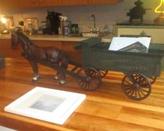 cast iron horse and cart