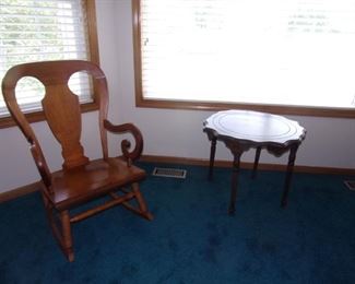 Beautiful vintage rocking chair. Small accent table.