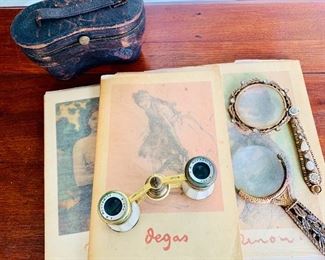 Books and opera glasses from France. 
