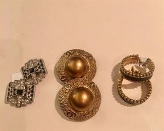 L. to R., Givenchy, Chanel, Yves St. Laurent