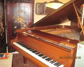 Baldwin Baby Grand.  This item may be sold ahead of the sale to allow us more room.  