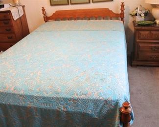 Full size bed with retro bedspread