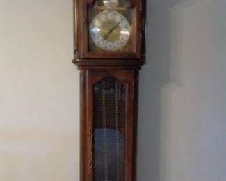 grandfather clock / needs adjustment