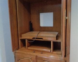 inside of armoire/entertainment center