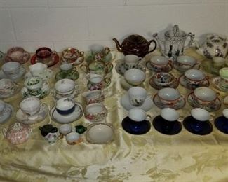 Teacup collection and tea pots