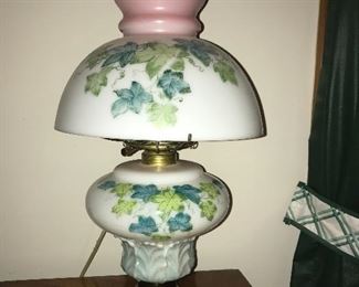 Antique kerosene/oil lamp electrified.