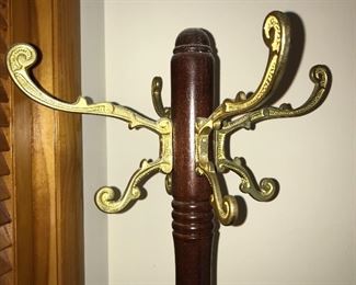 At least two vintage hat/coat racks.