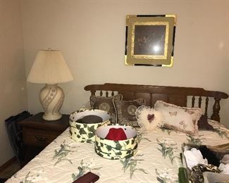 Vintage solid oak bedroom--wood dresser with framed mirror, queen-size bed and non-matching oak nightstand.