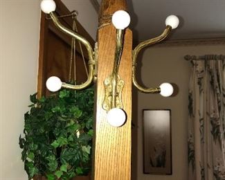 At least two vintage hat/coat racks.