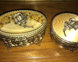Gold-tone filigree jewelry/trinket boxes.